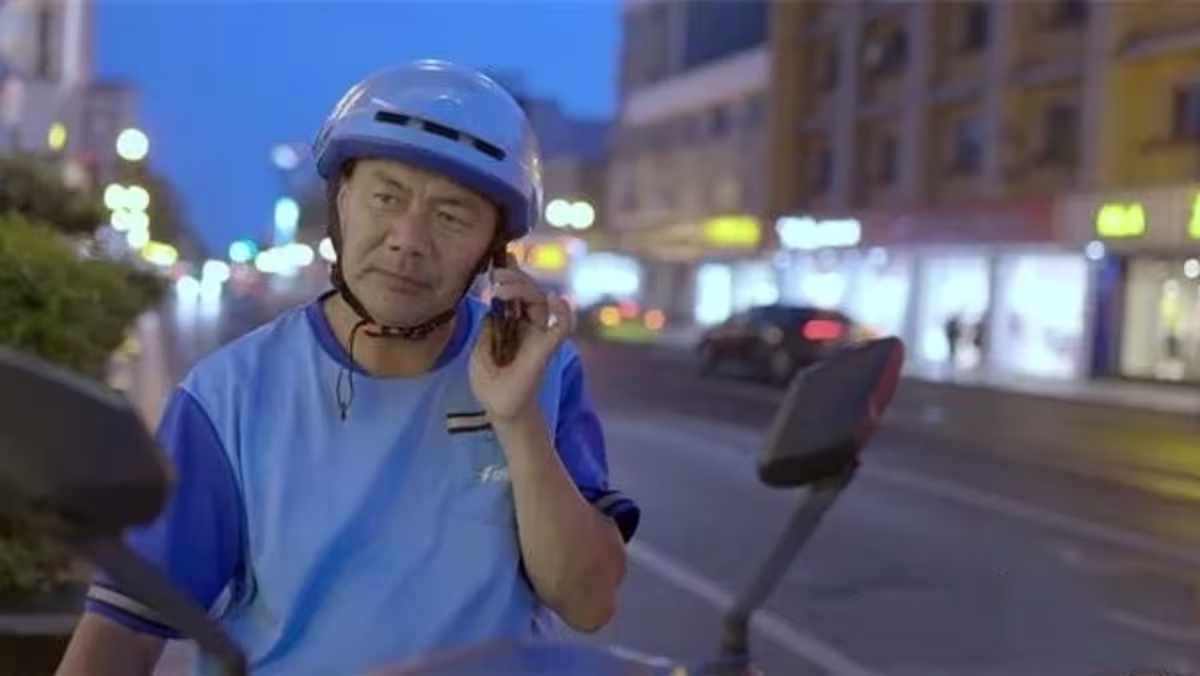 He delivers food by day and pens poetry by night. Now he’s won China’s top literary prize