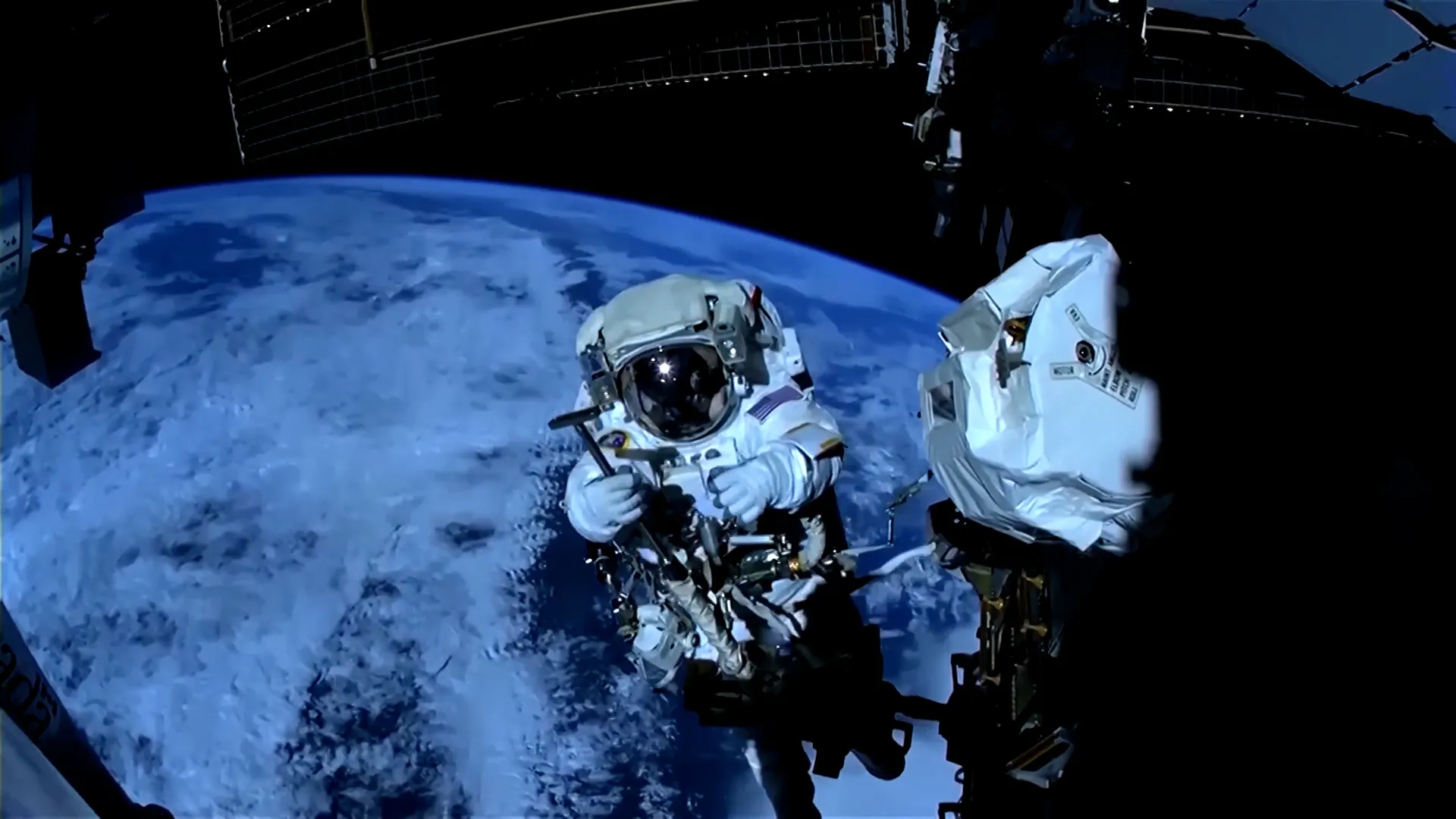 NASA astronauts spacewalk to fix robotic arm | Space