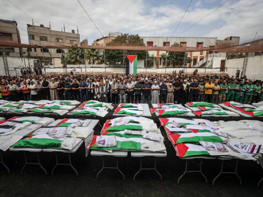 Funeral held for 75 Palestinians after remains recovered from Gaza ruins | Israel-Palestine conflict News